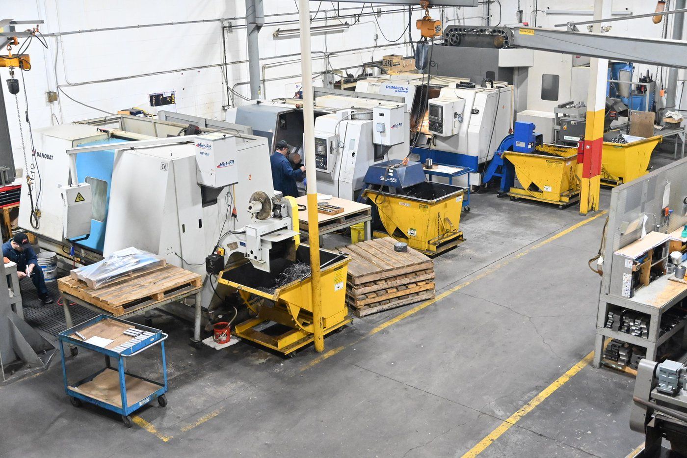 CRC Wellhead machine shop floor, Edmonton — CNC cells, fabrication bays and staff